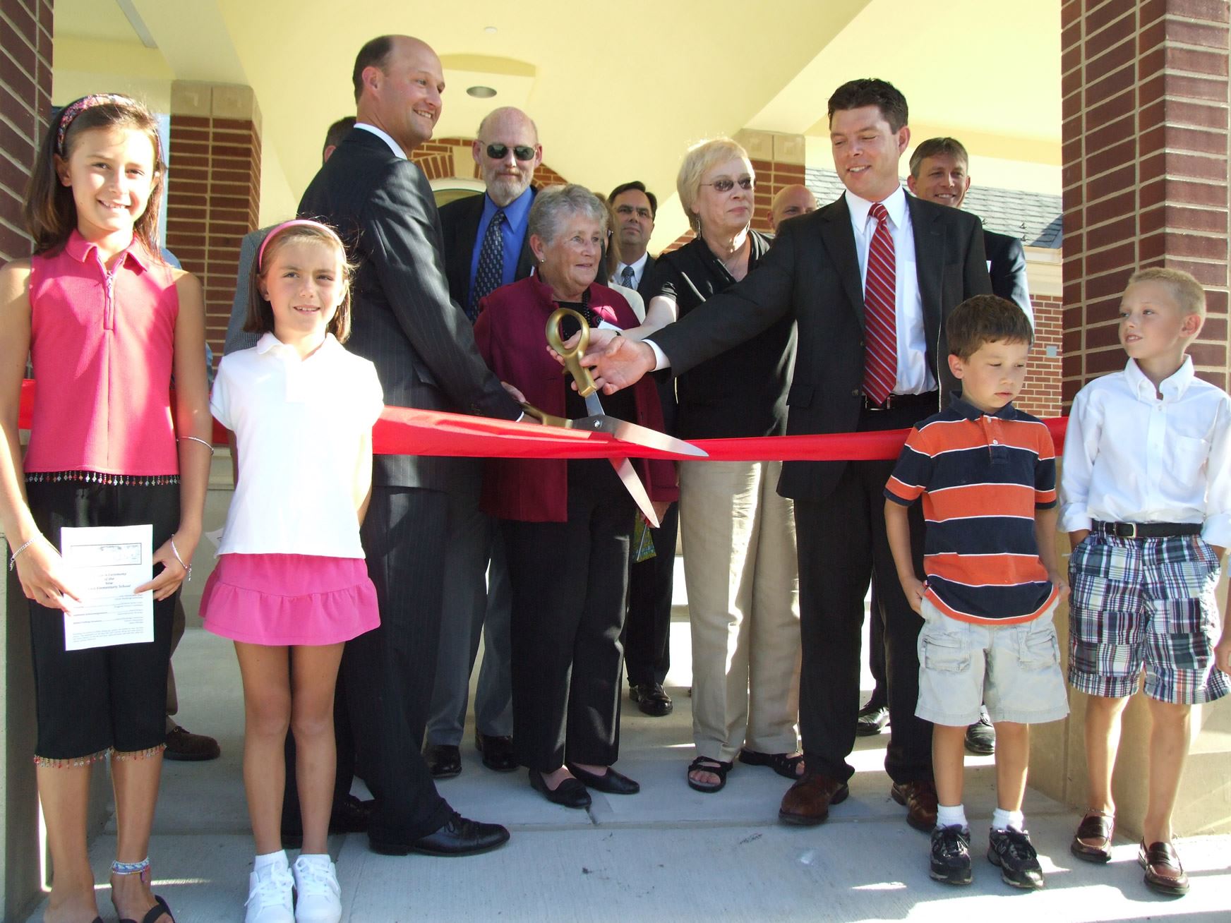 Grand Opening Ribbon Being Cut